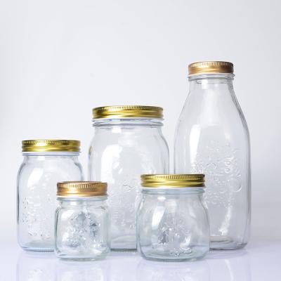 China Eco-freindly Wholesale 150ml-1000ml Food Honey Jar Candy Coffee Tea Containers Clear Glass Spice Storage Jar With Metal Lid for sale