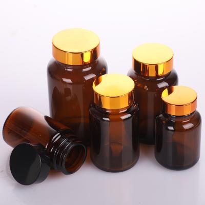 China Wholesale 60ml 75ml 90ml 150ml 200ml Amber Medicine Capsule Pill Glass Empty Medicine Bottles Jar With Black Screw Cap Cap for sale