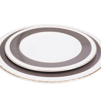 China Sustainable Hotel Special Design Modern Dinner Plate Set Gold Rim Ceramic Dinner Set Dinnerware for sale