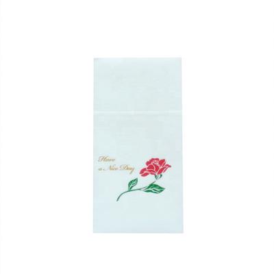 China Custom Printed Logo Rose Pattern Airlaid Paper Napkins Fabric with Cutlery Pocket for sale