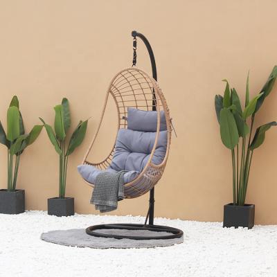 China Strong.durable rattan egg hanging chair with cushion in patio and garden swing for sale