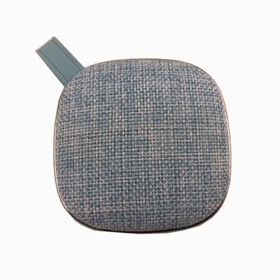 China 2019 new mini cute portable wireless bluetooth fabric waterproof radio speaker for sale