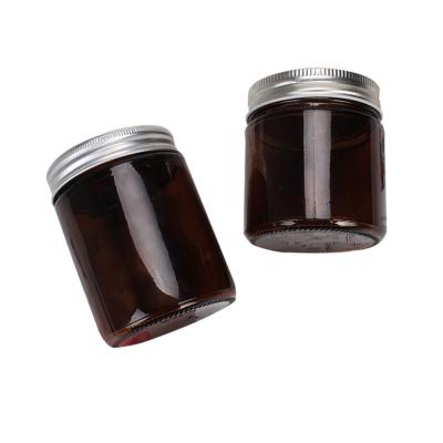 China Gift Maker Empty 100ml 200ml 250ml 300ml Wide Mouth Round Amber Glass Candle Jar With Screw Lid for sale