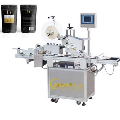 China Automatic Food Top Y Flat Surface Paging Labeling Machine Medicine Food Plastic Bags Sticker Labeling for sale