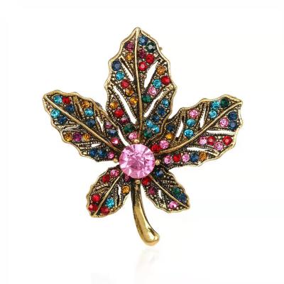 China Luxury Elegant Crystal Hoja Collar Leaf Brooches Muslim Brooch Vintage Floral Multicolor Sweater Metal Suit Pins for sale