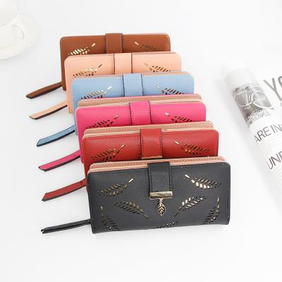 China 2021 New Arrival Fashion Anti-theft Hollow Leaves Patterned Ladies Long Wallets PU Women Leather Clutch Purse for sale