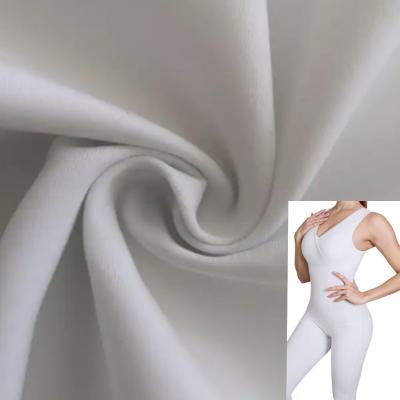 China Stretch Weft Knitted Interlock 250 g/sm DTY 65 Nylon Spandex 35 Fabric For Gaiters for sale