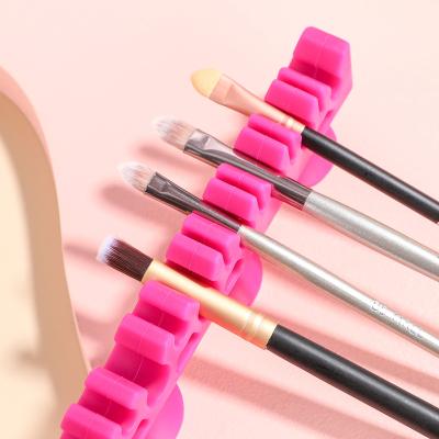 China Wholesale High Quality Eco-friendly Wall Mounted Makeup Brush Holder Silicone Makeup Brush Holder Silicon Makeup Brush Dryer Holder for sale