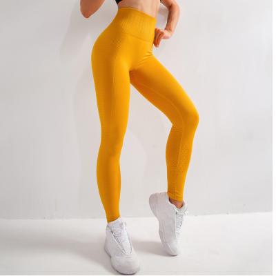 China Antibacterial Yellow Tight Pants High Waist Leggings Seamless Gym Pant Gaiters for sale