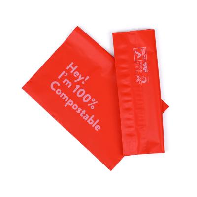 China Strong Adhesive Red Poly Mailer Shipping Biodegradable Clothes Packaging Bags For Clothing for sale