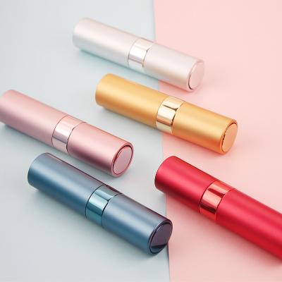 China Travel 8ml Hotsale Cosmetic Rose Gold Silver Blue Aluminum Twist Up Empty Perfume Atomizer for sale