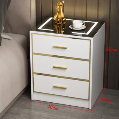 China Modern light luxury smart bedside table with wireless charging and induction light for sale