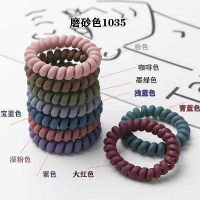 China Fashion Creative Charming New Matt Solid Color Frosted Spiral Tie Hair Band Elastic Hair Tie For Women Girls for sale