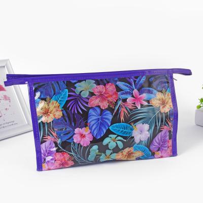 China COSMETIC BAG promotion travel custom PVC TPU printing cosmetic bag portable zipper makeup bag waterproof transparent toiletry bag for sale