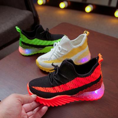 China 2021 Kids Sports Shoes Breathable Flying Woven Woven Sneakers Wholesale Children's LED Light Sneakers Shoes For Kids for sale