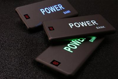 China Custom Laser LED Logo Flashing Light Portable Mobile Power Bank 5000mAh for Promotional gift for sale