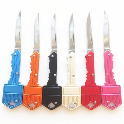 China New Style 2021 Survival Yellow Folding Pocket Knives Stored Key Chain Key Shaped Knife Self Defense Knife Pocket Key for sale