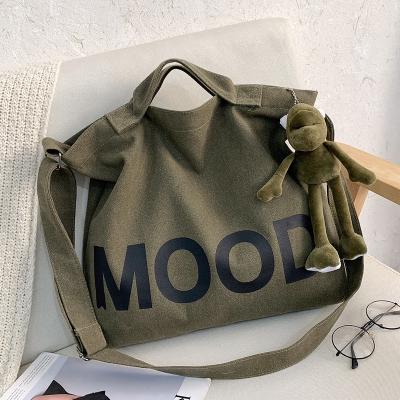 China Waterproof shoulder bag Toto bag with canvas fabric and waterproof fror man and woman large capacity with logo customized for sale