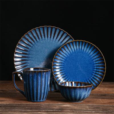 China New Arrival Sustainable Reactive Gloss Restaurant Serving Shiny Blue Stoneware 16 Pieces Dinnerware Set for sale