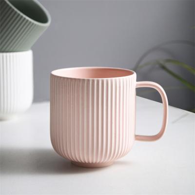 China Viable elegant custom logo embossed matte striped exterior pink style drinkware nordic stoneware tea coffee mug for gift for sale