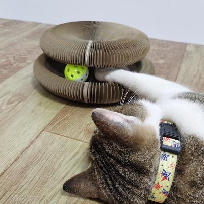 China Cat Scratching Board Corrugated Cardboard Stocked with Bell Ball for sale