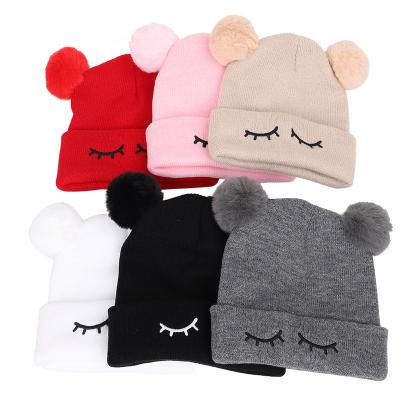 China Fashion .2021 fashion knitted embroidered child knitted hats children wear boys autumn style big eyes wool top girls winter warm hat for sale