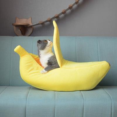 China Cute Travel Pet Bed Banana Lovely Small Shape Fluffy Warm Soft Plush Bed Breathable Banana Cat Bed for sale