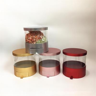 China Recycled Materials Stock high quality metal paper Round clear flower box Round PVC Flower Gift Box with Drawer Round PVC Rose box for Valentine for sale