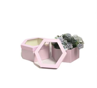 China Recycled Materials Transparent Window Hexagonal Kraft Paper Flower Boxes Gift Box Packaging For Present Luxury for sale