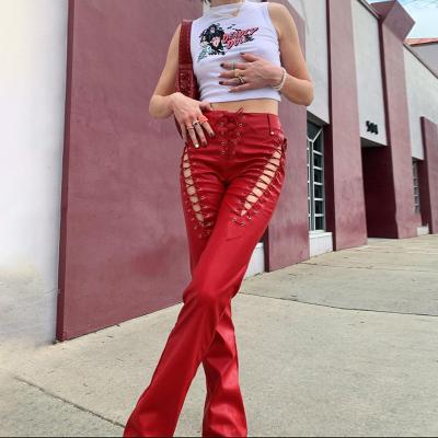 China 2021 Spring Breathable Women Casual Streetwear Wrap Hip PU Pants Hollow Out Lace Up Faux Leather Straight Pants for sale