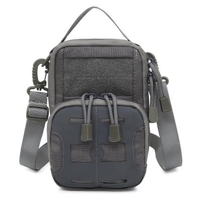 China Anti-theft manufacturers the direct sale of the lightweight wallet bag mobile phone sling sling military bag for sale