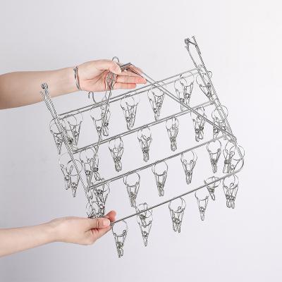 China Modern Clothespin Rack Folding Laundry Drying Rack Stainless Steel Sock Hanger with 52 Clips for sale