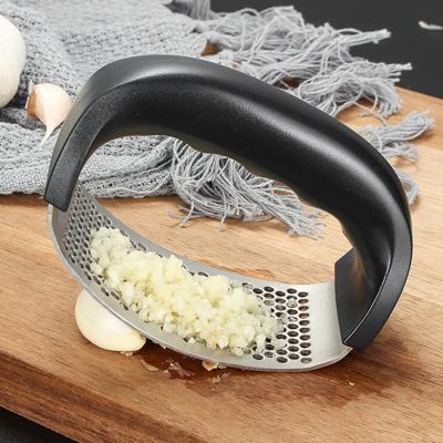 China Hot Selling Viable Professional Kitchen Helper Manual Garlic Crusher Stainless Steel Garlic Crusher for sale