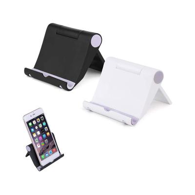 China Portable Tablet Foldable Table Stand Cell Phone Stand Desktop Gravity Android Cell Phone Holder For iPhone for sale