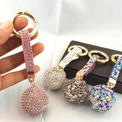 China Crystal Ball Car Keychain Fantasy High Quality Rhinestone Souvenir Leather Bracelet Key Chain for sale