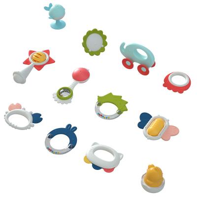 China Softly 16 PCs Bell Teether Ring Hanging Baby Bell Teething Toy Baby Rattle Silicone Teether Rattles Set with Storage Box for sale