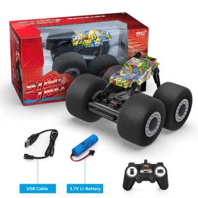 China Wholesale 2.4G 3.7V/1200mAh Super Soft RC Model Big Wheels Rock Crawler 4WD Stunt Remote Control Car For Boys for sale