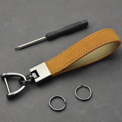 China Customized Handmade Embossed Genuine Leather Key Chain Heavy Duty Logo Fashion Accessories Men Women Car With Accessories for sale