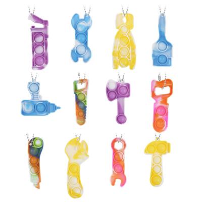 China Wholesale 12pcs/set New Small Key Chain Finger Decompression Hanging Decompression Toy Eco-friendly Rainbow Press Mini Tool train fidgety person toys for kids for sale