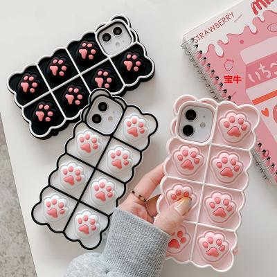 China Funny Cute Cat Paw Shape Pressing Game Toy Silicone Phone Case Effortless Anti-fall Protective Case Anti-Falling Cute Fidgeting Person for sale