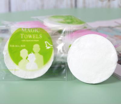 China Essential Bamboo Compressed Cloth Nonwoven Disposable Compressed Towel Fiber Travel Magic Towel for sale