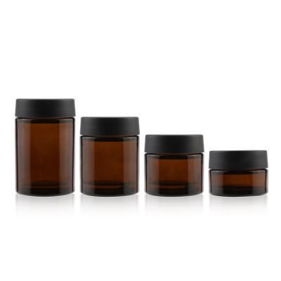 China Medicine Wholesale 1oz 2oz 3oz 4oz Child Resistant Glass Jar Empty Amber Glass Jar Cream Cosmetic Sets for sale