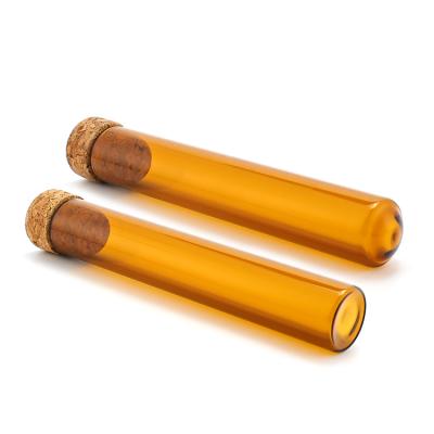 China 25ml Essential Oil Glass Tube Smell Proof Glass Container Small Amber Glass Vials With Cork Stopper For Herb Pill Packaging for sale