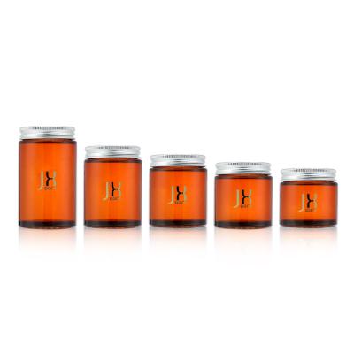 China Viable Wide Mouth Round Storage Jar Kitchen Tea Food Container Amber Airtight Glass Jar With Aluminum Lid for sale