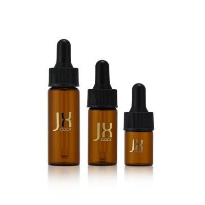 China Wholesale 5ml 10ml 20ml Cosmetic Amber Round Glass Bottle Personal Care Essential Oil Droppers for sale