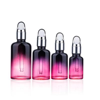 China 10ml 20ml 30ml 50ml Luxury Red Transparent Skin Care Essential Oil Serum Glass Dropper Bottle Cosmetic Bottle for sale