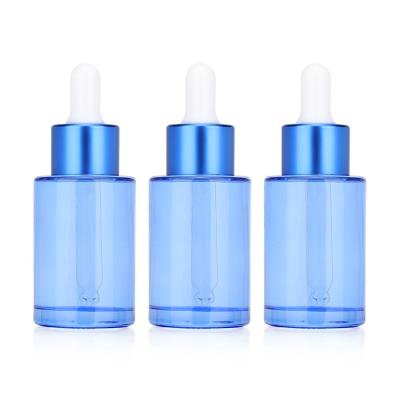 China Cosmetic Blue Flat Oil Serum Skin Care Cylinder Bottle Shoulder Essential Oil Glass Bottle for sale