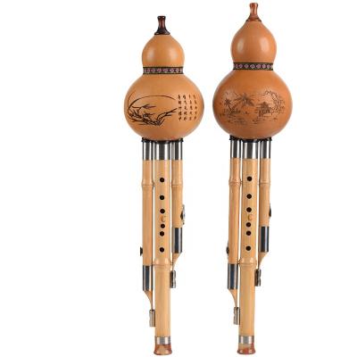 China Phyllostachys pubescens Yunnan Hulusi Musical Instrument Golden Wire Nanzhu Three Detachable Hulusi Tone for sale