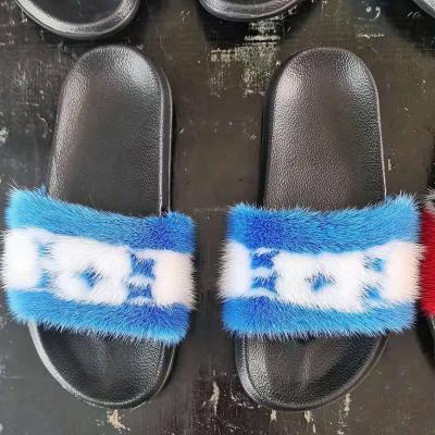 China Damping Luxury Flag Fur Slides Women Mink Fur Slippers Wholesale Mink Fur Slippers for sale