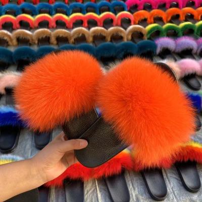 China Fashion trend in sale women's fur fluffy slippers slide sandals cheap real pvc fluffy soft unique fox fur slippers for sale